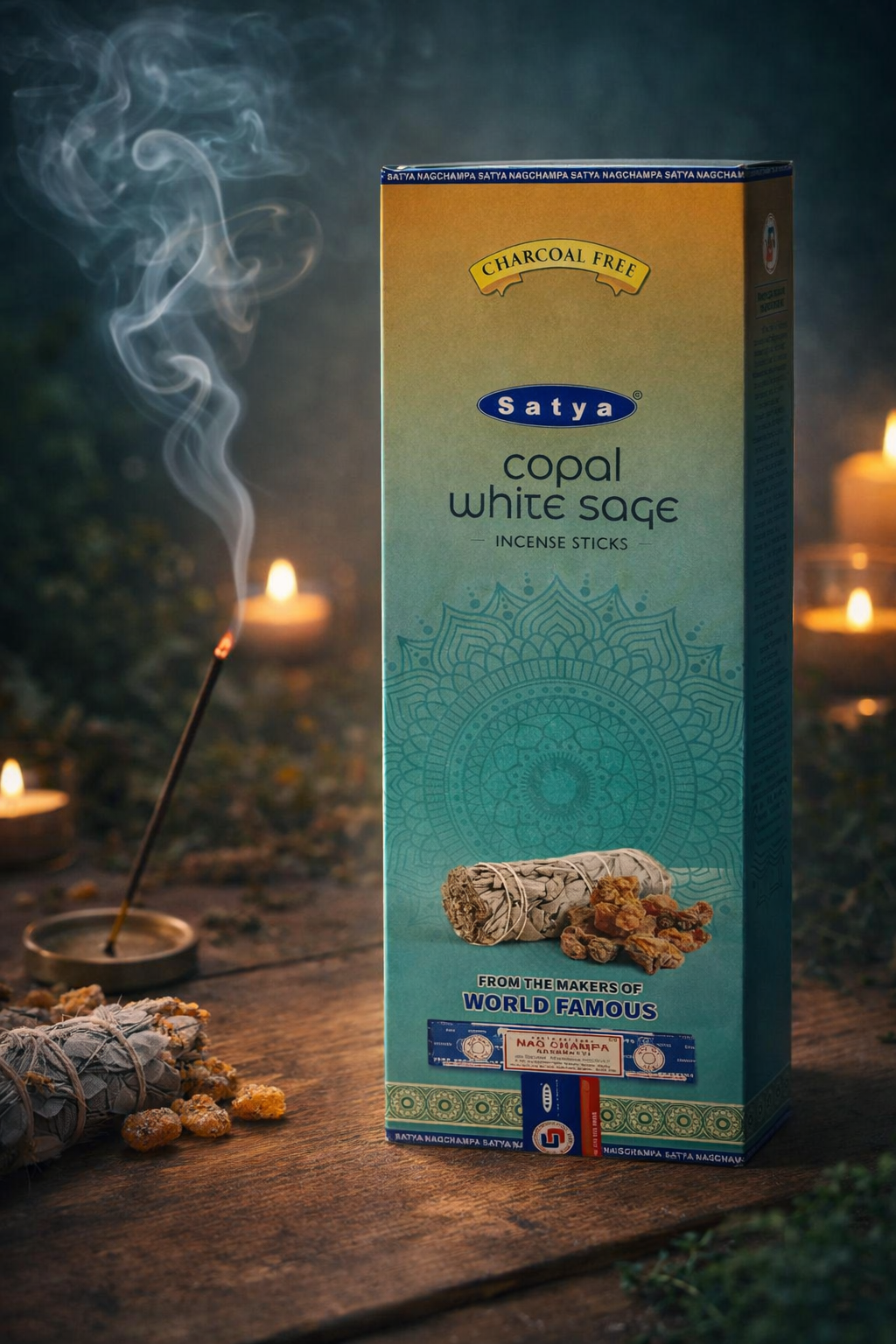 Box of Satya copal white sage incense sticks with incense burning in the background